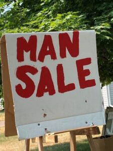 Summer man sale sign